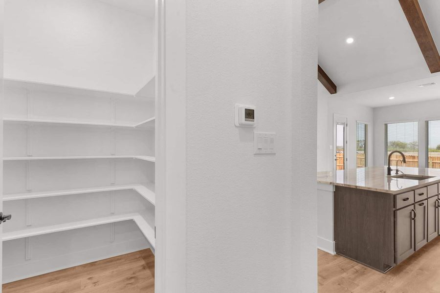 Furnished interior view inside a new home in The Grove at Blackhawk, Pflugerville (Image 12).