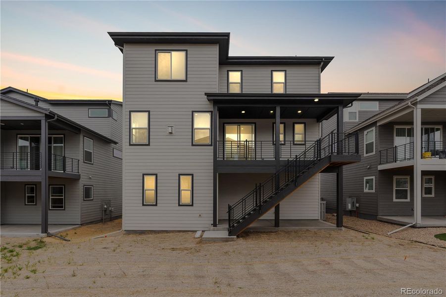 Exterior details and patio area of a home in Tribute at Lyric, Lone Tree (Image 26).