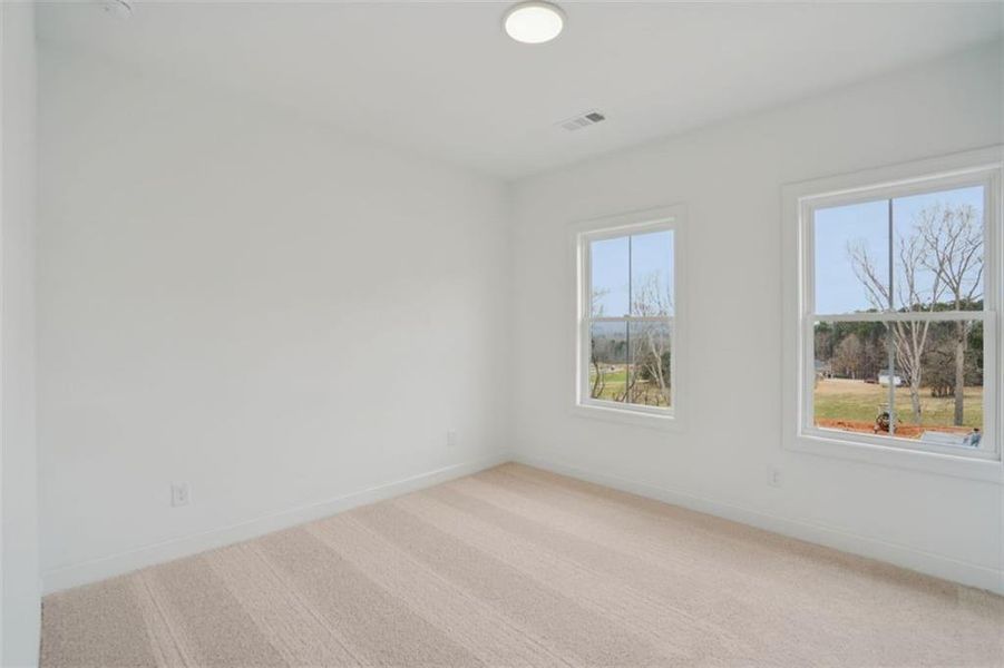 Spacious, unfurnished interior of a new home in Waterhaven, Cumming (Image 23).