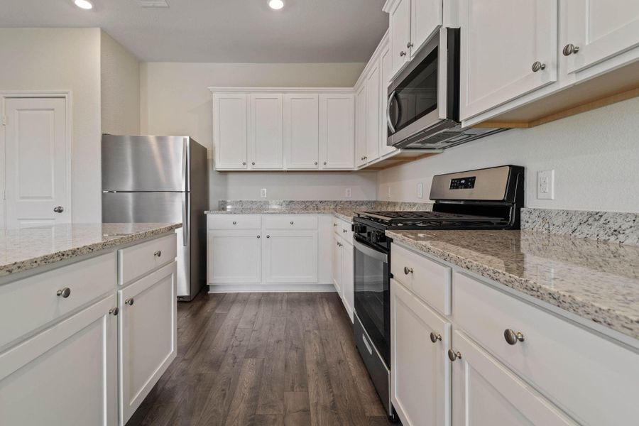 Furnished interior view inside a new home in Sweetwater Ridge, Conroe (Image 5).