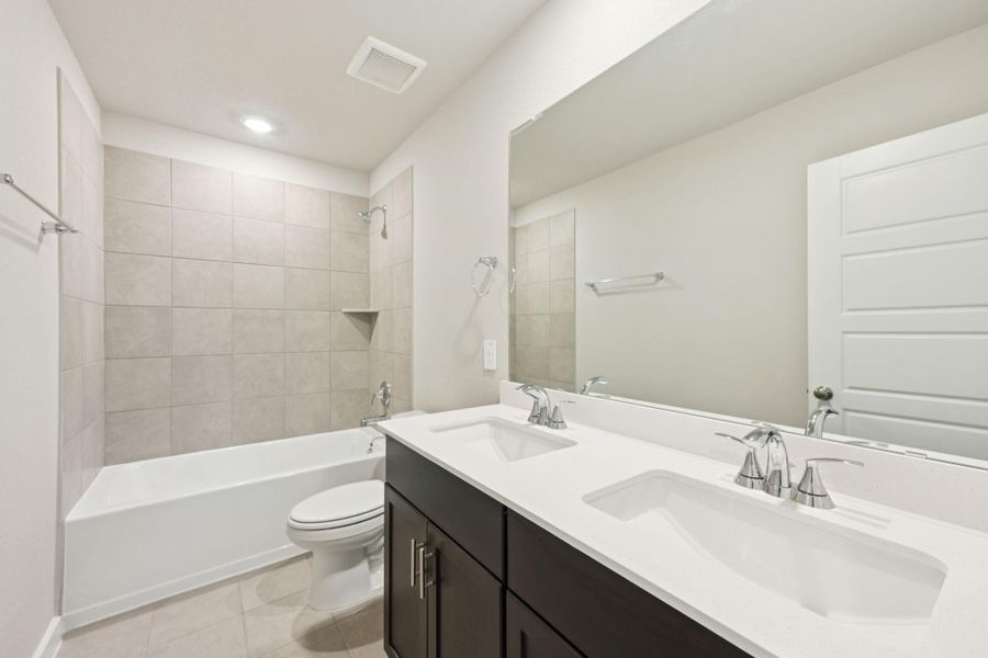 Furnished interior view inside a new home in Heights of Barbers Hill, Mont Belvieu (Image 12).