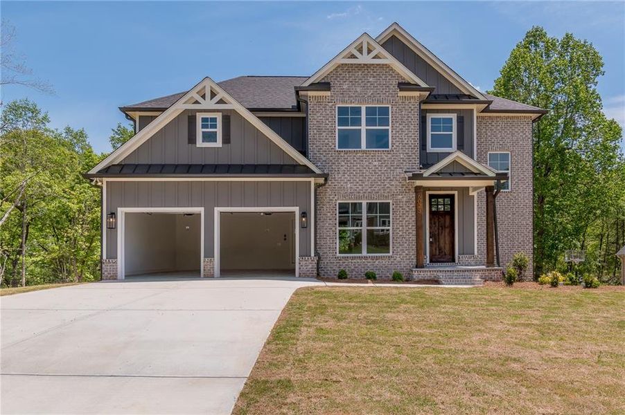 Front exterior of a new home in , Gainesville, GA, highlighting curb appeal (Image 22). Front exterior of a new home in , Gainesville, GA, highlighting curb appeal (Image 22).