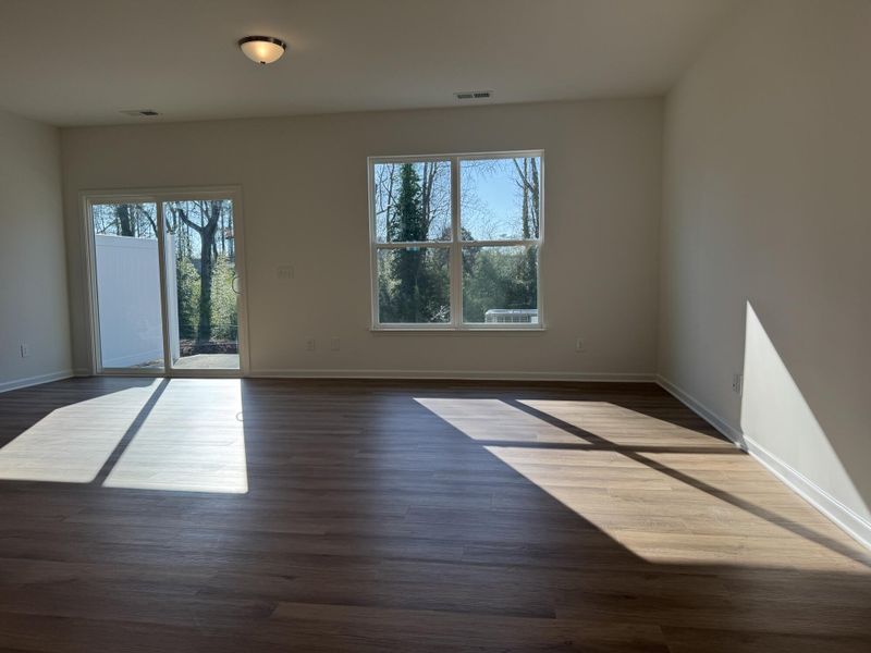 Spacious, unfurnished interior of a new home in East Main Townes, Spartanburg (Image 12).