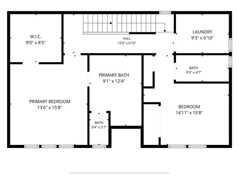 Third-floor plan featuring the primary suite, secondary bedroom, laundry room, and additional full bath.