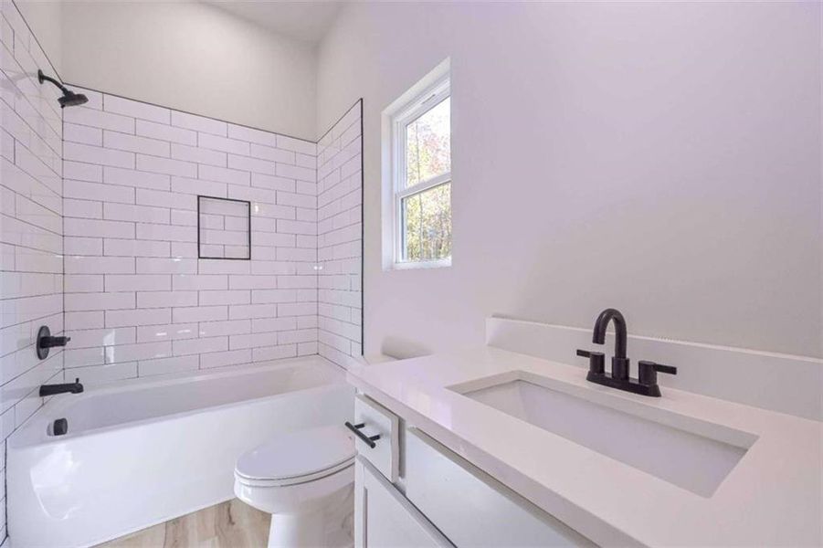 Furnished interior view inside a new home in , Buchanan (Image 8).