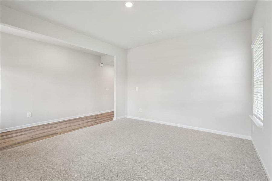 Spacious, unfurnished interior of a new home in Northwoods at Mirror Lake, Villa Rica (Image 32).