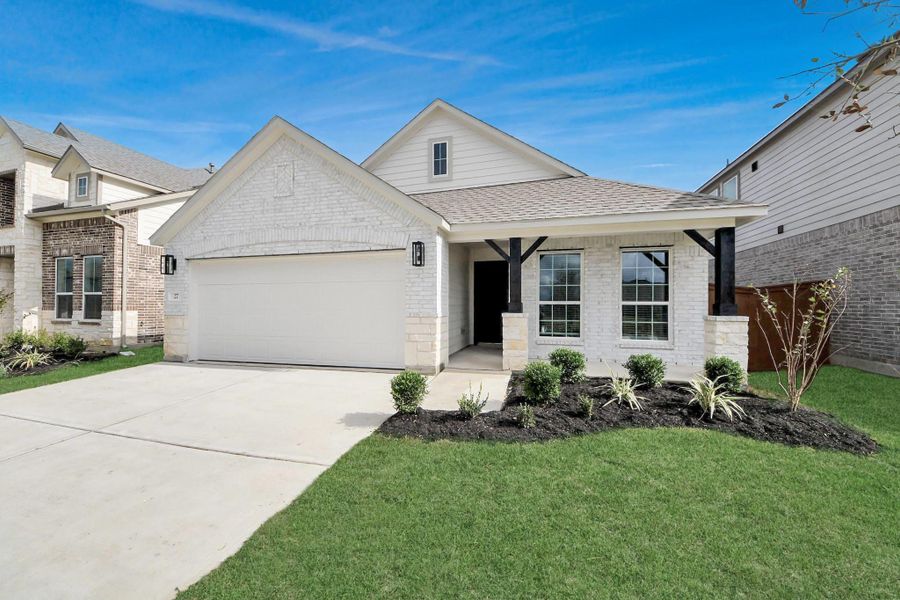 Home features a convenient 2-car garage complemented by a spacious driveway, offering ample parking for you and your guests. Home features a convenient 2-car garage complemented by a spacious driveway, offering ample parking for you and your guests.