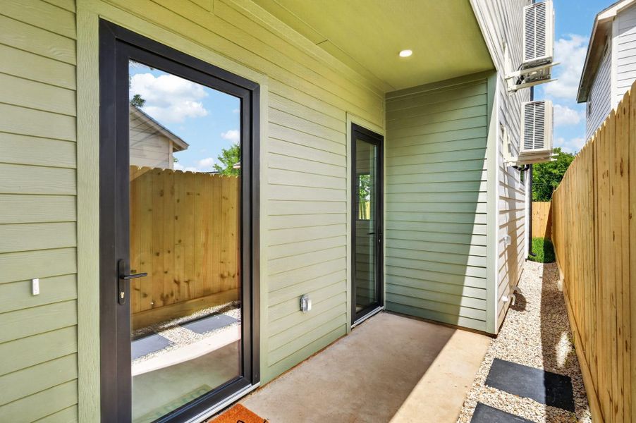 Exterior details and patio area of a home in , Houston (Image 27). Exterior details and patio area of a home in , Houston (Image 27).