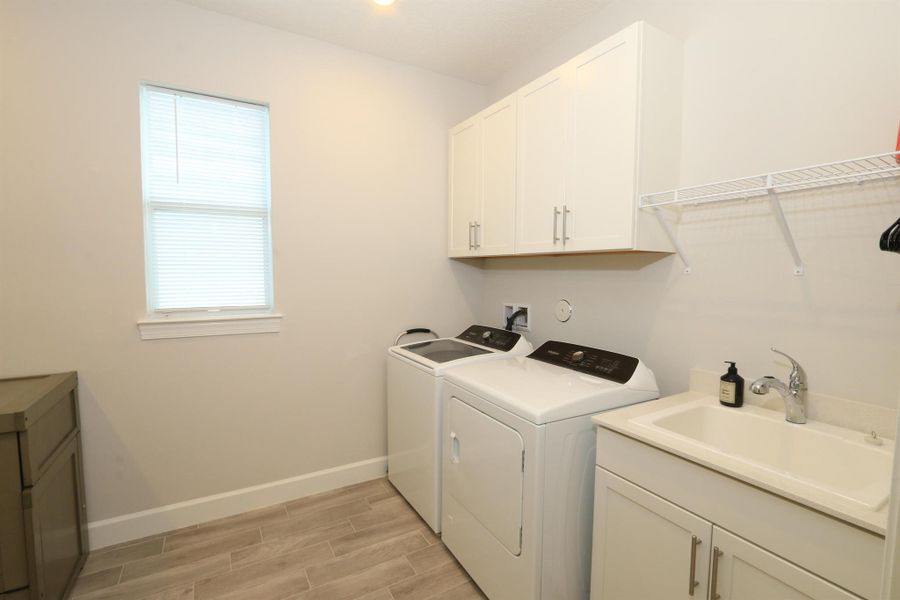Furnished interior view inside a new home in Del Webb Tradition, Port St. Lucie (Image 8).