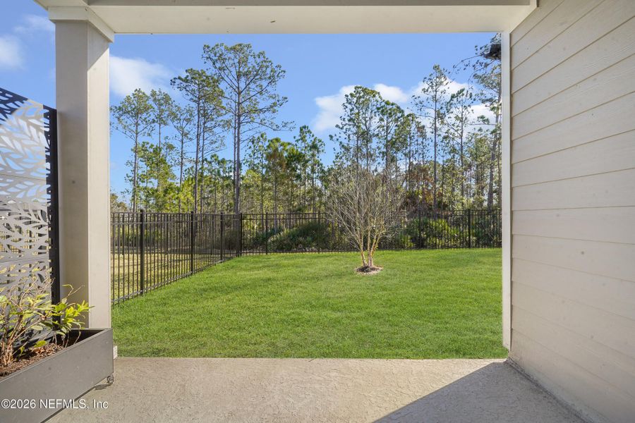 Exterior details and patio area of a home in Seminole Palms Single-Family Homes, Palm Coast (Image 2).