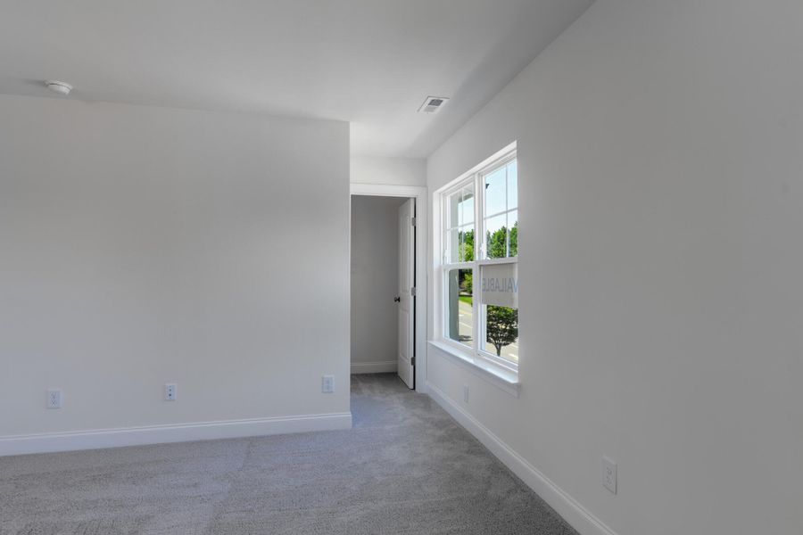 Spacious, unfurnished interior of a new home in Enclave at Traditions Townhomes, Wake Forest (Image 20).