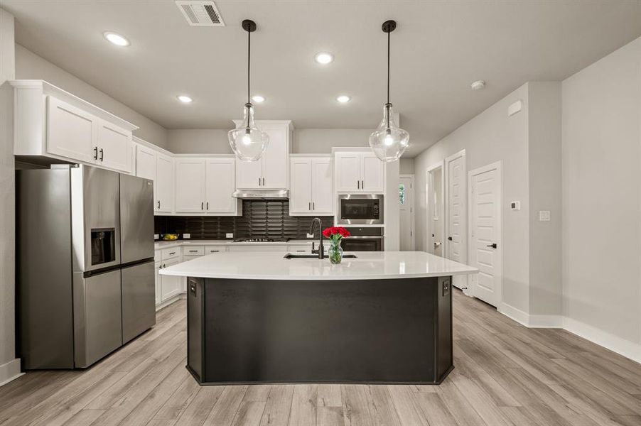 Furnished interior view inside a new home in HomeTown Garden, North Richland Hills (Image 28). Furnished interior view inside a new home in HomeTown Garden, North Richland Hills (Image 28).