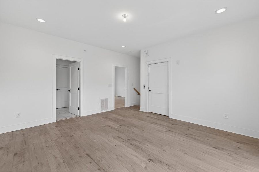 Spacious, unfurnished interior of a new home in Skyview On Broad, Sugar Hill (Image 12). Spacious, unfurnished interior of a new home in Skyview On Broad, Sugar Hill (Image 12).