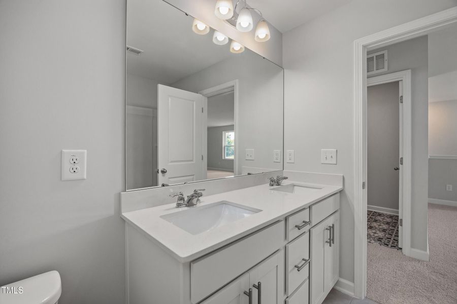 Furnished interior view inside a new home in Woodland Crossing, Zebulon (Image 11).