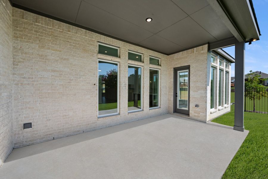 Exterior details and patio area of a home in Panchasarp Farms, Burleson (Image 4). Exterior details and patio area of a home in Panchasarp Farms, Burleson (Image 4).