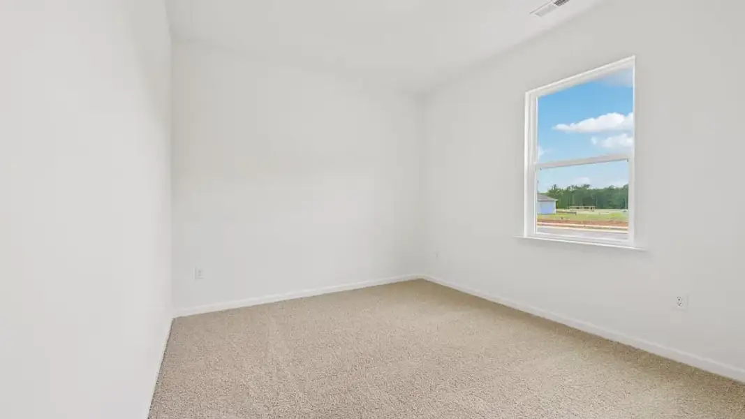 Spacious, unfurnished interior of a new home in The Villas at Laurel Oaks, Sanford (Image 13).