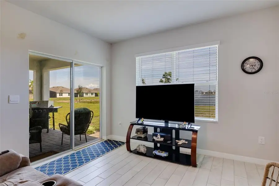 Furnished interior view inside a new home in Coral Bay - Express & Tradition, North Fort Myers (Image 8).
