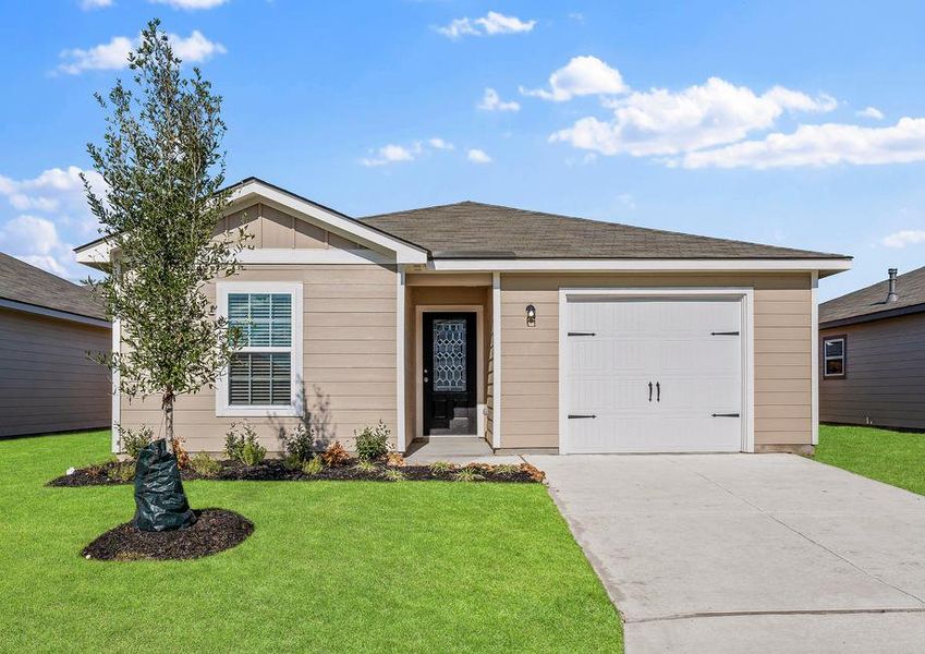 The beautiful Ash floor plan by LGI Homes with front yard landscaping.