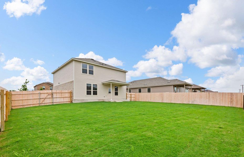 Front exterior of a new home in Sonterra, Jarrell, TX, highlighting curb appeal (Image 14). Front exterior of a new home in Sonterra, Jarrell, TX, highlighting curb appeal (Image 14).