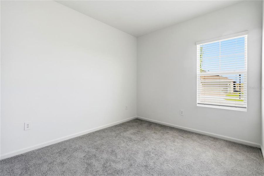 Spacious, unfurnished interior of a new home in Wellness Ridge, Clermont (Image 21).