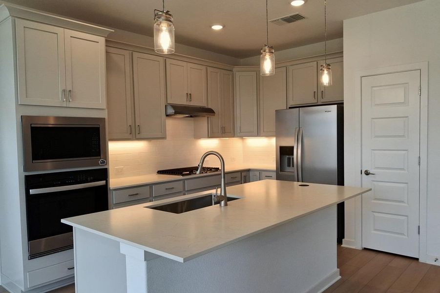 Furnished interior view inside a new home in Wolf Ranch, Georgetown (Image 9).