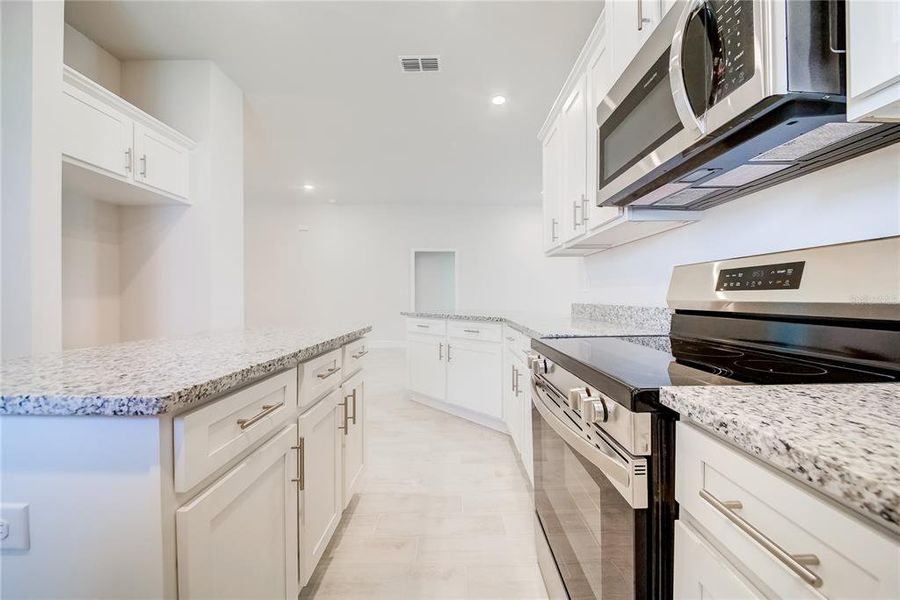 Furnished interior view inside a new home in Aviary at Rutland Ranch, Parrish (Image 11).