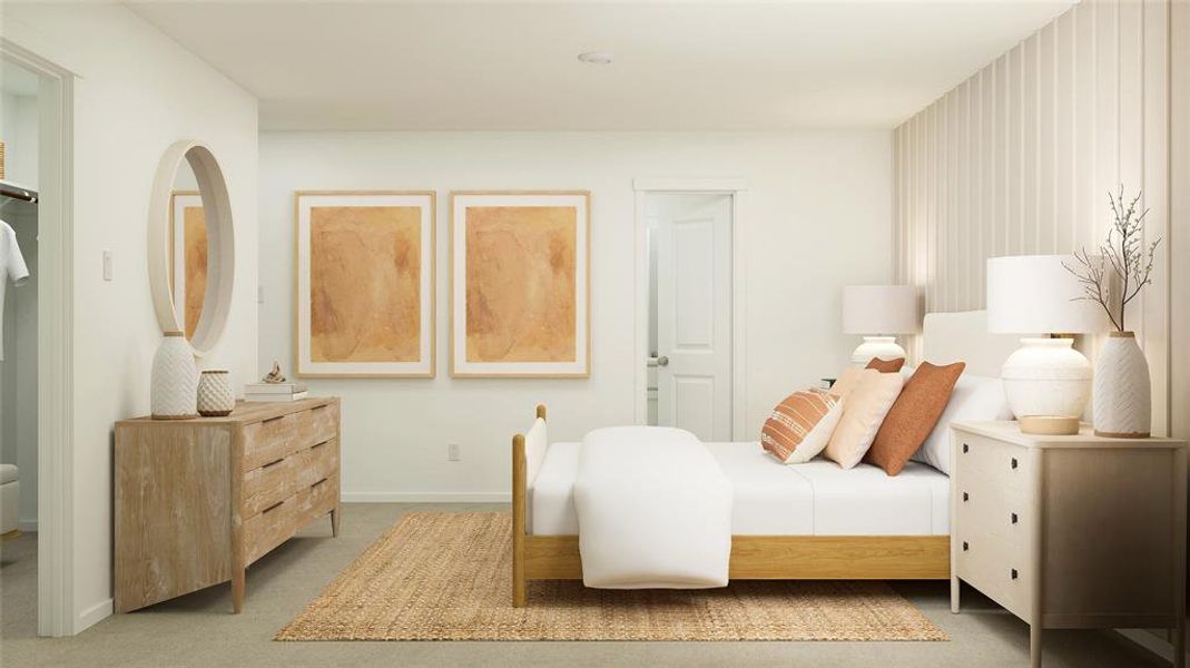 Bedroom featuring carpet flooring and baseboards