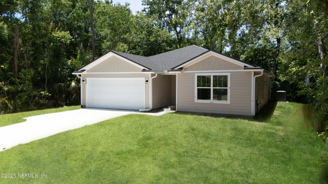 Front exterior of a new home in , St. Augustine, FL, highlighting curb appeal (Image 16).