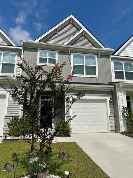 Front exterior of a new home in , Goose Creek, SC, highlighting curb appeal (Image 1). Front exterior of a new home in , Goose Creek, SC, highlighting curb appeal (Image 1).