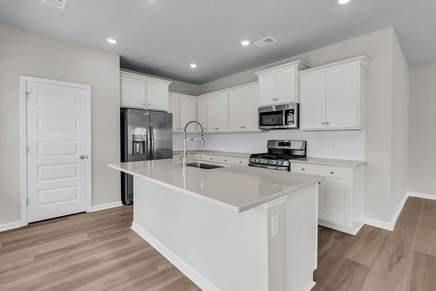 Furnished interior view inside a new home in Horizons at Summers Corner | 55+: The Cottages, Summerville (Image 14). Furnished interior view inside a new home in Horizons at Summers Corner | 55+: The Cottages, Summerville (Image 14).