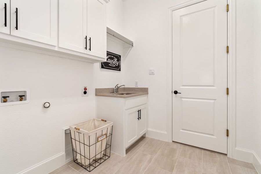 Plan 1639 Laundry Room Representative Photo by American Legend Homes