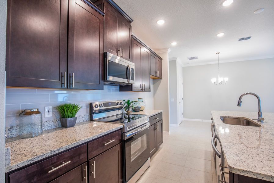 Furnished interior view inside a new home in Heritage Station, Punta Gorda (Image 9). Furnished interior view inside a new home in Heritage Station, Punta Gorda (Image 9).