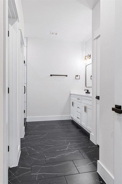 Bathroom featuring vanity