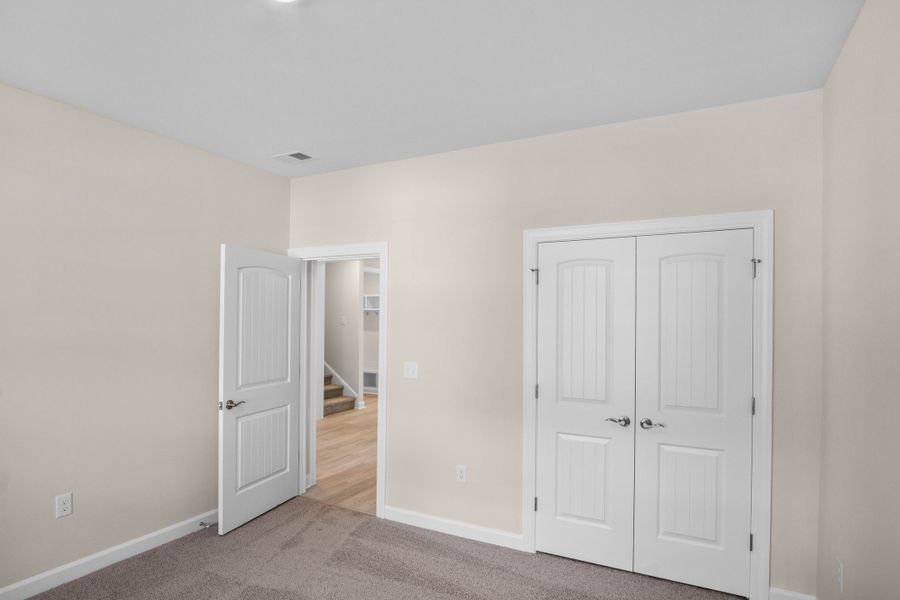 Spacious, unfurnished interior of a new home in Coastal Club of the Carolinas, Calabash (Image 19).