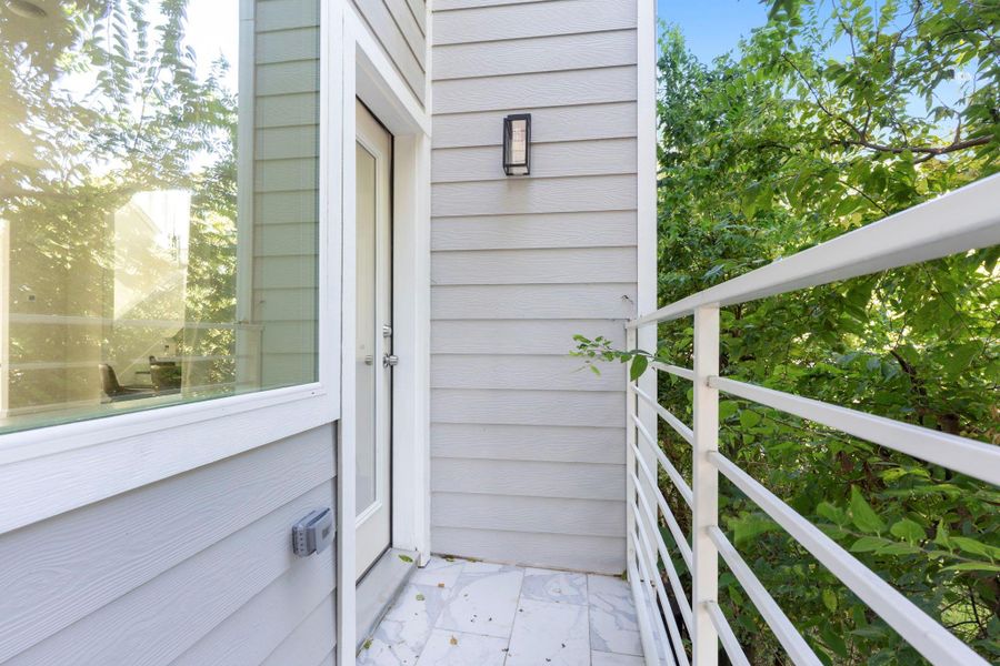 Private balcony offering a relaxing spot to enjoy the view. Private balcony offering a relaxing spot to enjoy the view.