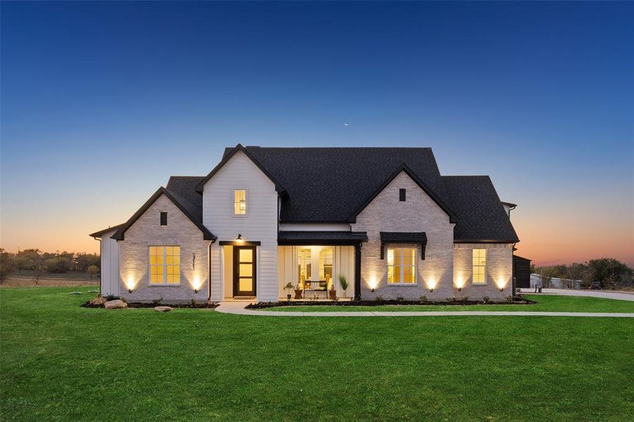 Front exterior of a new home in , Justin, TX, highlighting curb appeal (Image 2).