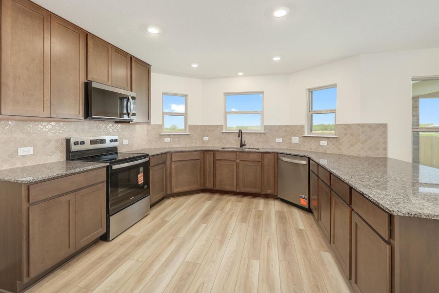 Furnished interior view inside a new home in Stoney Chase, Del Valle (Image 6).
