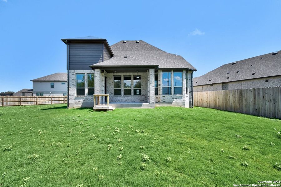 Front exterior of a new home in Alsatian Oaks: 50ft. lots, Castroville, TX, highlighting curb appeal (Image 1).
