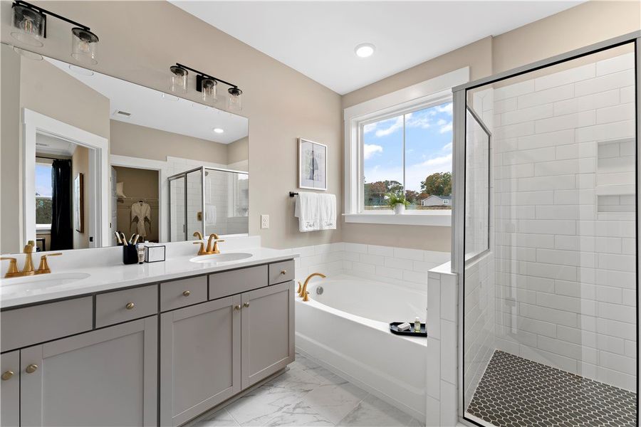 Primary Bathroom. Staged for photography—furniture and décor not included. A home has since been built next door and is visible out the window.