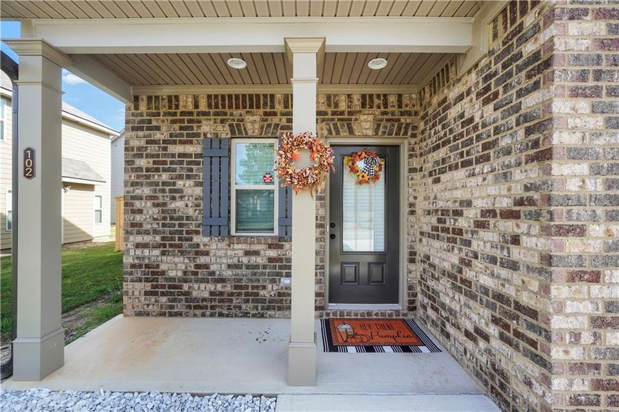 Exterior details and patio area of a home in Garden Walk, Jackson (Image 4).