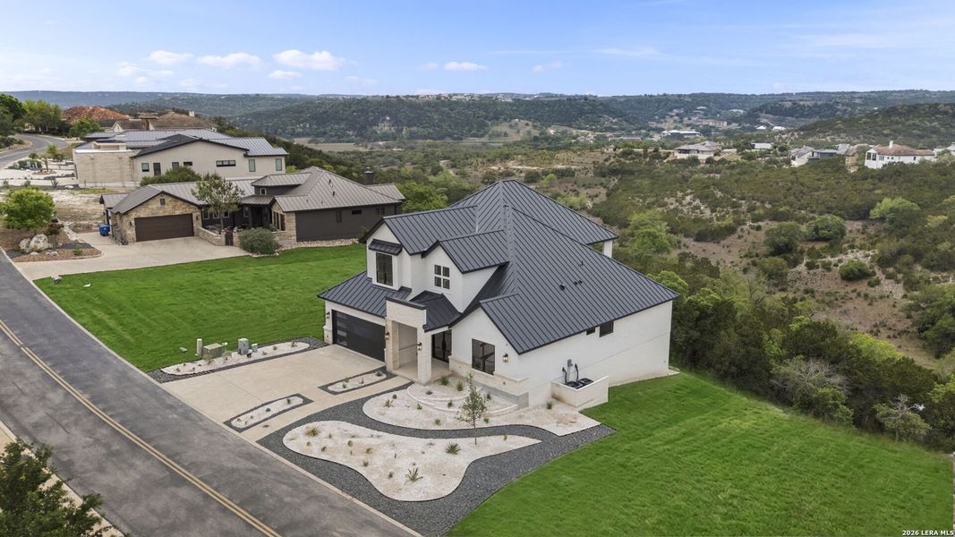 Front exterior of a new home in , Boerne, TX, highlighting curb appeal (Image 31).