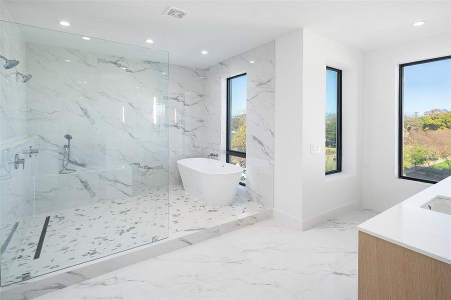 Bathroom with vanity and independent shower and bath