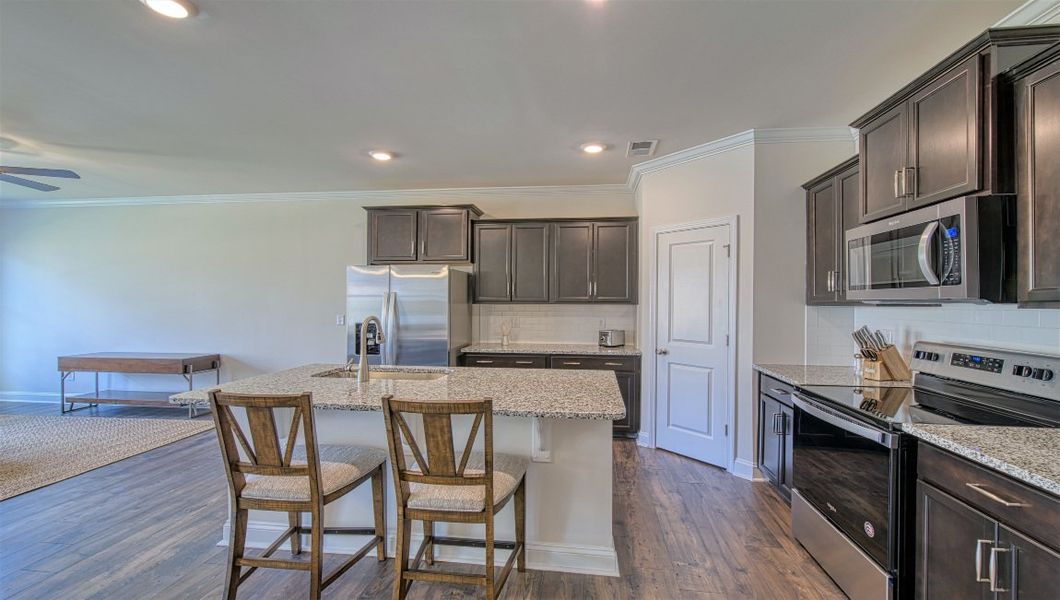Furnished interior view inside a new home in Townes at Tap Root Farms, Fletcher (Image 9). Furnished interior view inside a new home in Townes at Tap Root Farms, Fletcher (Image 9).
