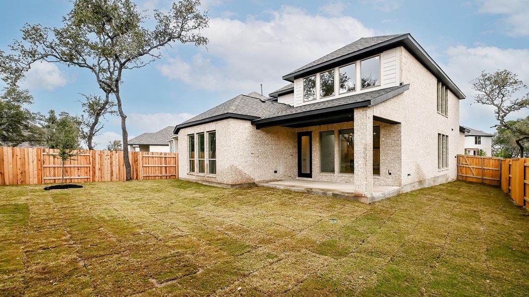 Exterior details and patio area of a home in 6 Creeks, Kyle (Image 3).