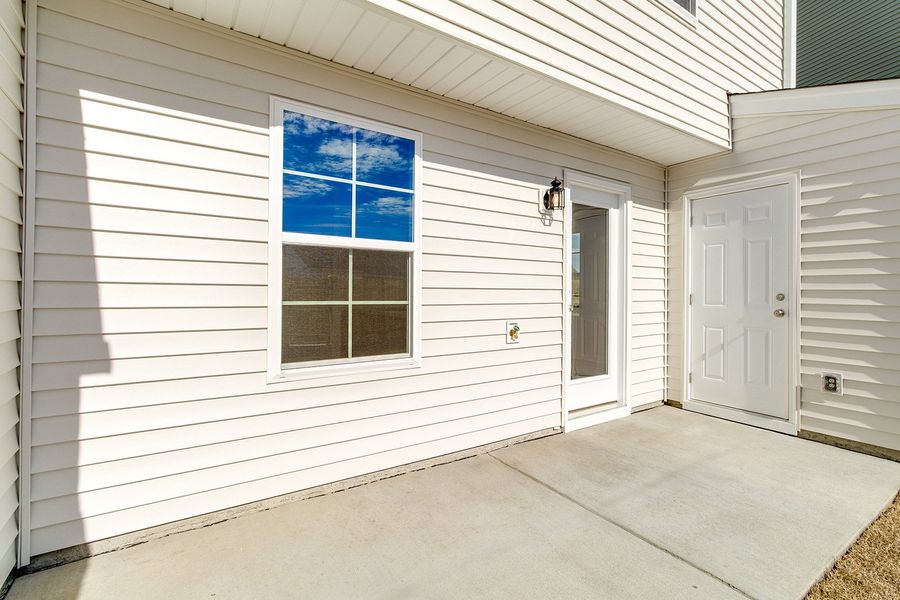 Exterior details and patio area of a home in Astoria, Columbia (Image 3).