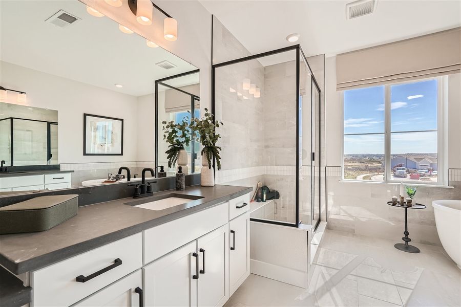 A kitchen with a large glass shower. A kitchen with a large glass shower.