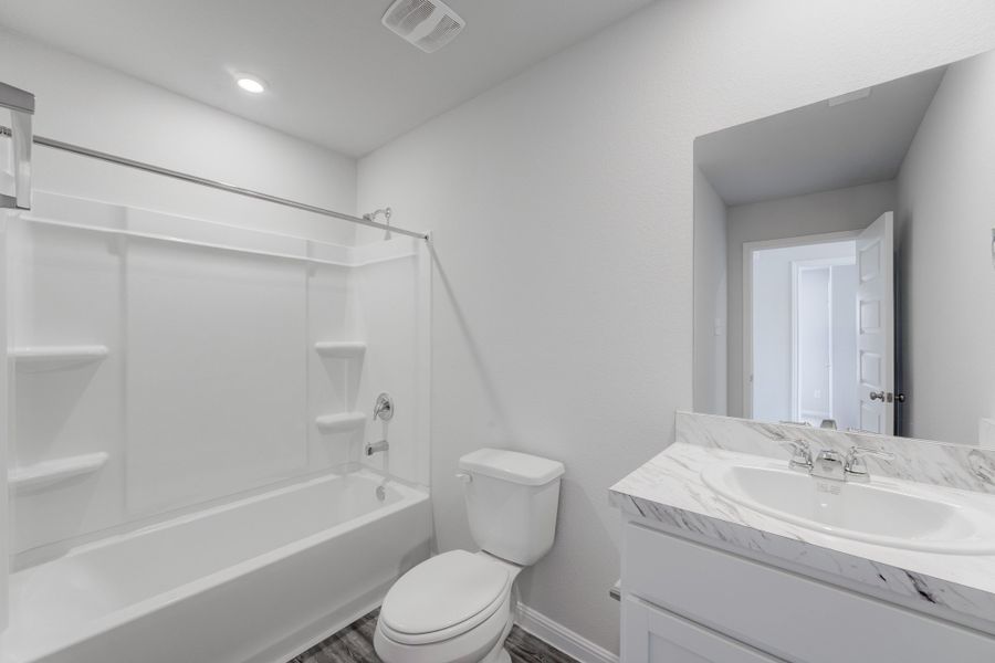 Furnished interior view inside a new home in Park Central, Mineola (Image 8).