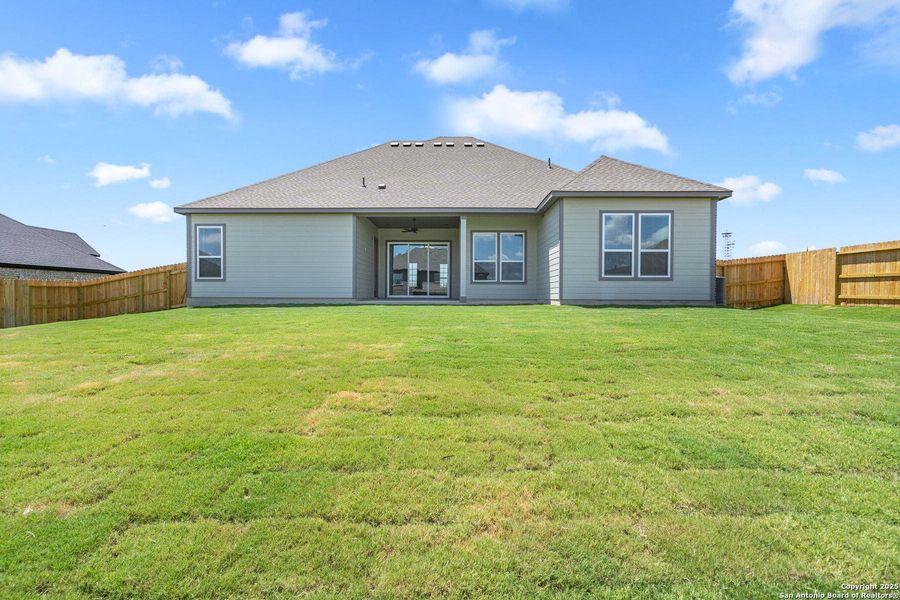 Exterior details and patio area of a home in Potranco West, Castroville (Image 2).