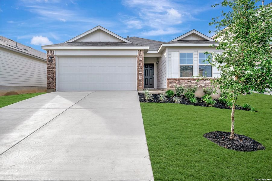 Front exterior of a new home in Agave, San Antonio, TX, highlighting curb appeal (Image 1). Front exterior of a new home in Agave, San Antonio, TX, highlighting curb appeal (Image 1).
