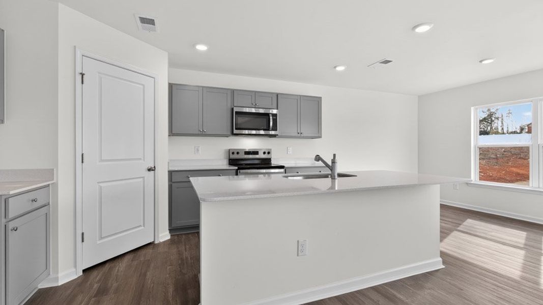 Furnished interior view inside a new home in Faircrest, Greensboro (Image 3).